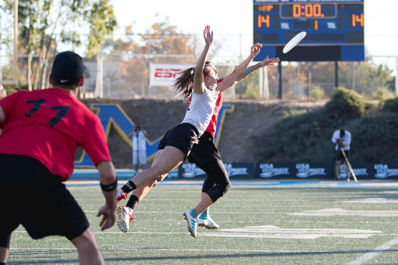 Philadelphia AMP's Malti McKinnon gets a layout block in the semifinal at the 2019 Club Championships. Photo: Greg Pettus -- UltiPhotos.com