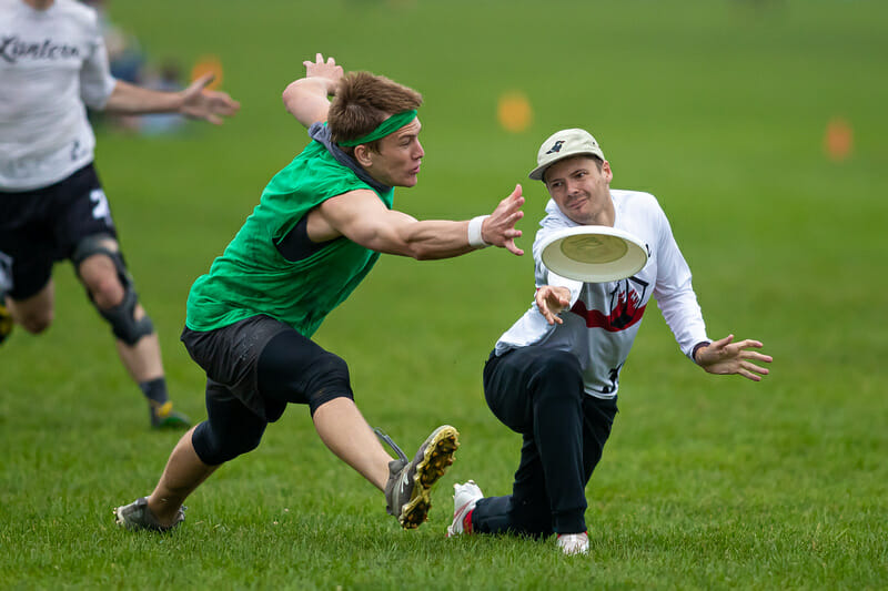 Players stepped out to get around their mark at the Boston Invitational. Photo: Burt Granofsky -- UltiPhotos.com