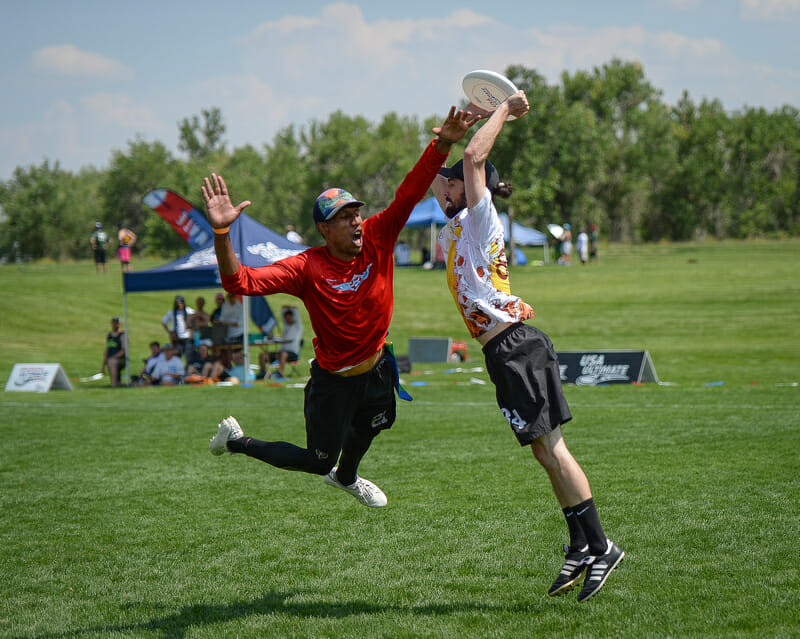 Joe Anderson bids for the disc on Saturday at the Masters Championships in Aurora, CO. Photo: Kevin Leclaire -- UltiPhotos.com