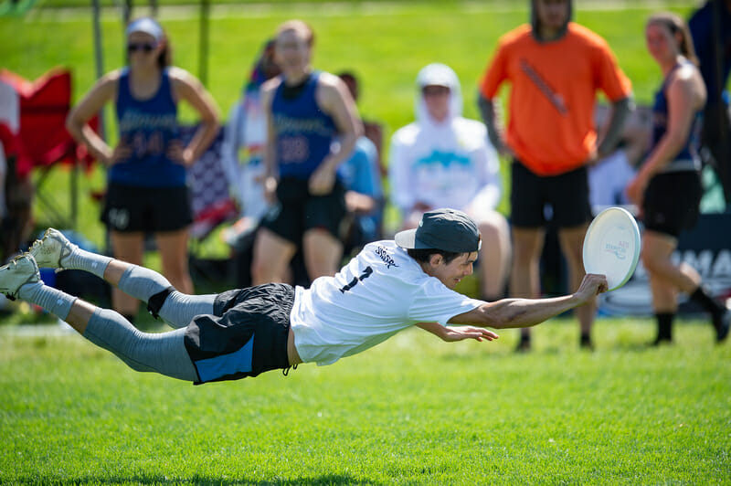 Peter MacArthur lays out for the disc in the mixed division at the Masters Championships. Photo: Kevin Leclaire -- UltiPhotos.com