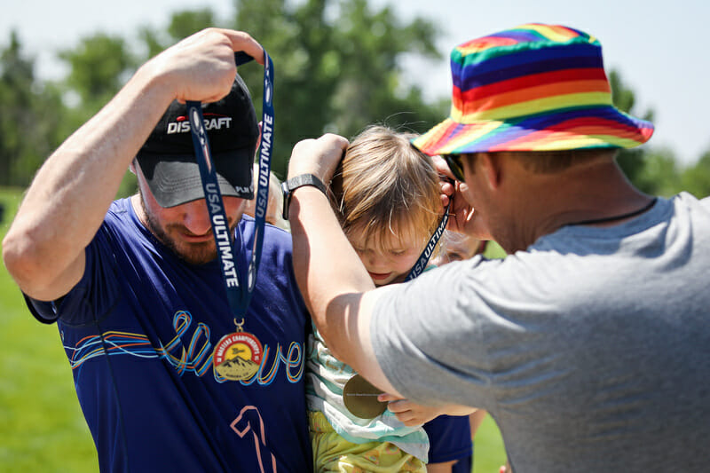 People of all ages receive medals at the Masters Championships awards ceremony. Photo: Kristina Geddert -- UltiPhotos.com