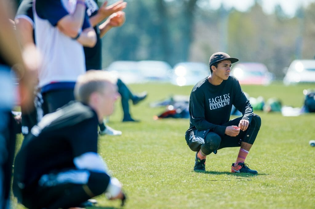 North Texas men's college ultimate frisbee players gaze towards the field. Photo: Taylor Nguyen -- UltiPhotos.com