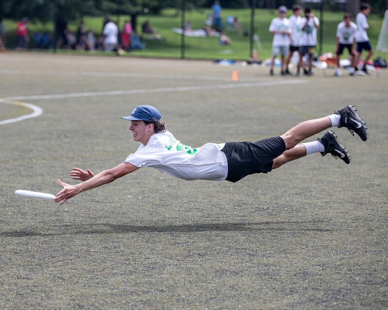 A player bids for the disc at the Northeast Youth Classic. Photo: Sandy Canetti -- UltiPhotos.com