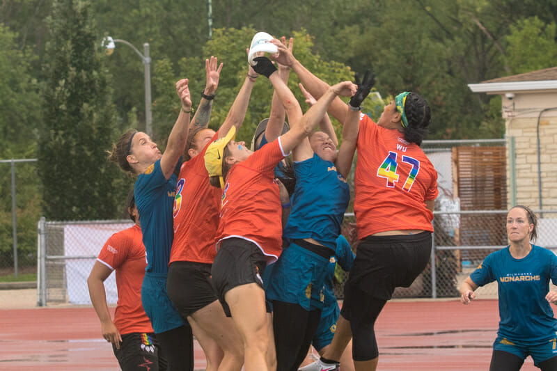 Keila Strick of Milwaukee Monarchs comes down with the disc to tie up the PUL Midwest Championships. Photo: Mark Olsen -- UltiPhotos.com