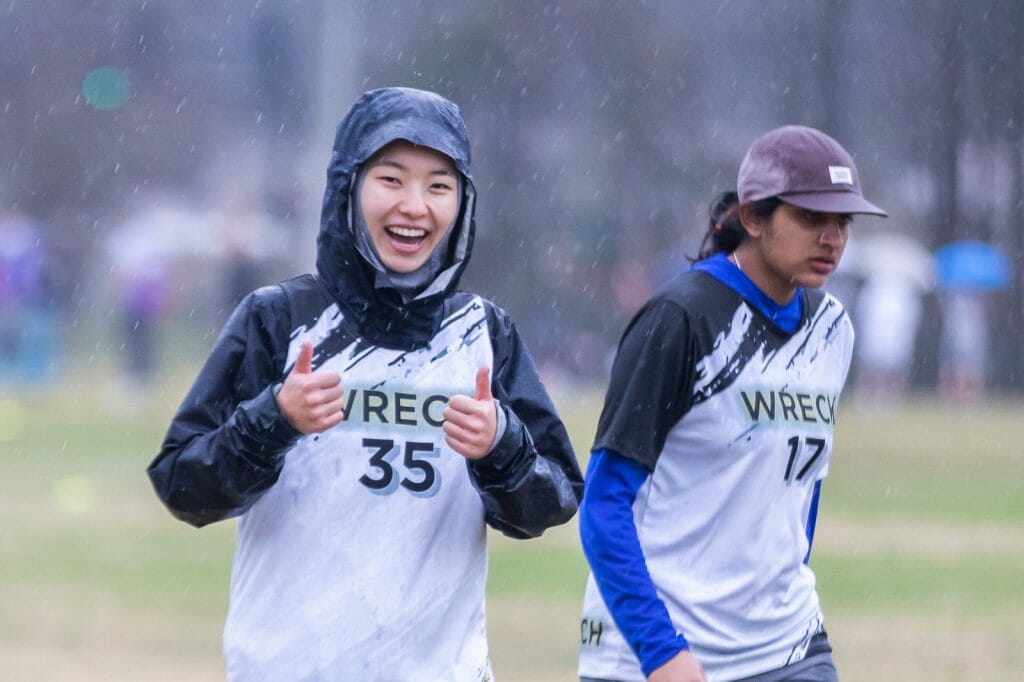 Georgia Tech Wreck college women's ultimate frisbee team players play through inclement weather. Photo: Katie Cooper -- UltiPhotos.com