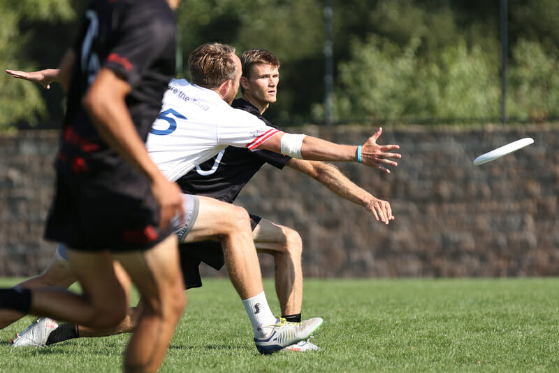 Sockeye's Matty Russell throws past Truck Stop's Jeff Wodatch in the 2021 Pro Championships final. Photo: Ken Forman -- UltiPhotos.com