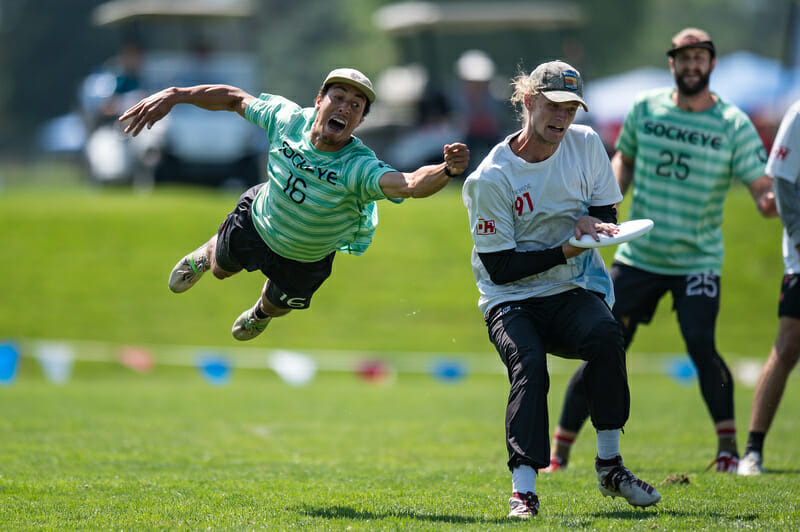 Sockeye's Trent Dillon misses a defensive bid against Machine's Joe White at the 2021 Pro Championships.