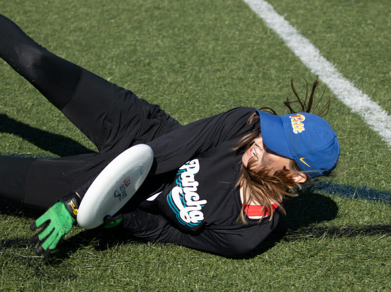 Gloves on and Nationals secured by Pittsburgh’s Annelise Peters in the final of 2021 Mid-Atlantic Club Regionals. Photo: Marshall Lian — UltiPhotos.com