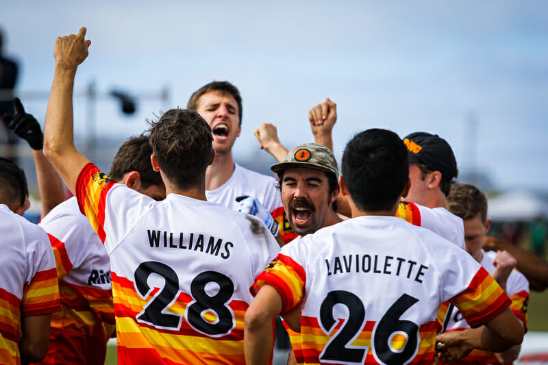 Ring of Fire celebrate their semifinal victory over Rhino Slam at the 2021 CLub Championships. Photo: Kristina Geddert -- UltiPhotos.com