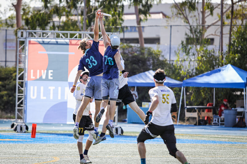 Hybrid's James Hill rises above the pack to make the catch in the 2021 Club Championships semifinal. Photo: Kristina Geddert -- UltiPhotos.com
