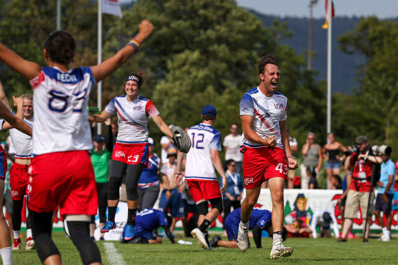 Joe Freund and the U24 US National Team celebrate winning a gold medal.