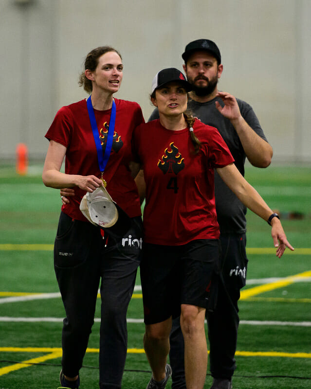 Seattle Riot's Gwen Ambler (left) with co-coaches Rohre Titcomb and Andy Loveseth at 2018 WUCC. Photo: Kevin Leclaire -- UltiPhotos.com