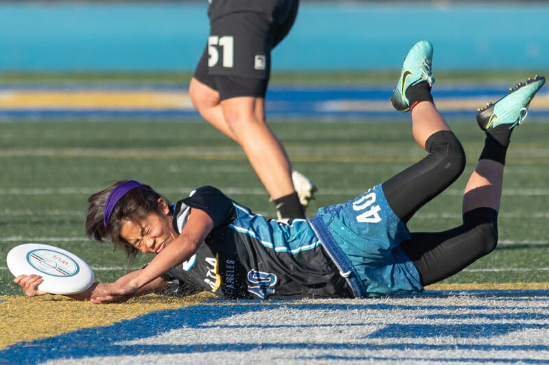 Veronica Yee saves possession for Los Angeles Astra at the Western Ultimate League's Winter Cup in 2021. Photo: Rodney Chen -- UltiPhotos.com 