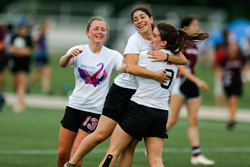 Middlebury celebrates a score at the 2019 D-III College Championships.