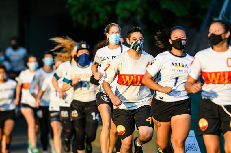 WUL players head onto the field for a one-game showcase in July 2021. Photo: Sam Hotaling -- UltiPhotos.com