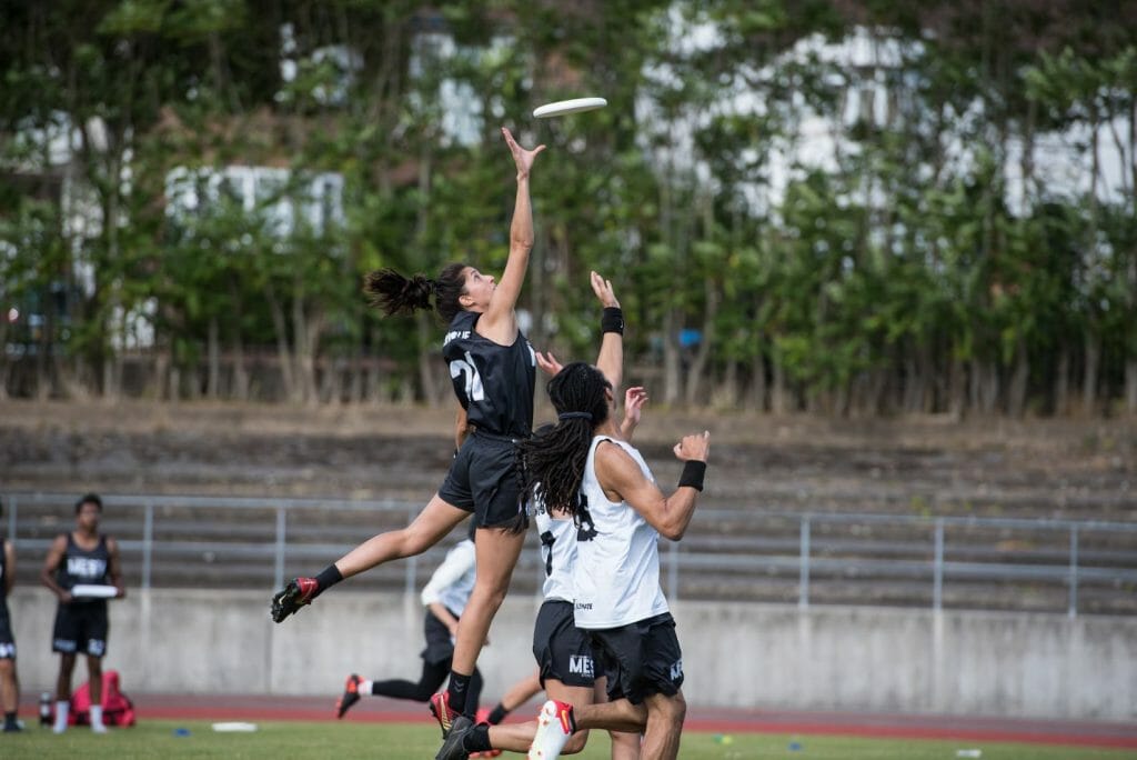 Mariana Larroque catches over Stefan Lewis at the MESH Showcase game. Photo: Andy Moss -- ShowGame