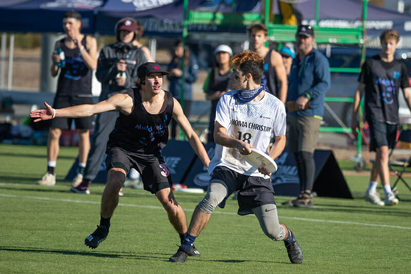 Middlebury's Leo Sovell-Fernandez and Oklahoma Christian's Elliott Moore are likely to be among the best performers of the 2022 D-III men's college season. Photo: Rodney Chen -- UltiPhotos.com