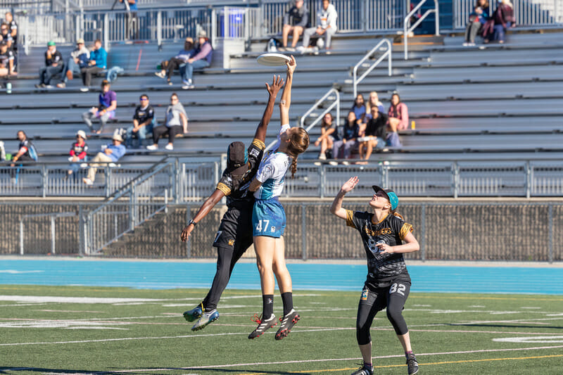 Dena Elimelech goes over the opposition for the catch for Los Angeles Astra at the Western Ultimate League's Winter Cup in 2021.