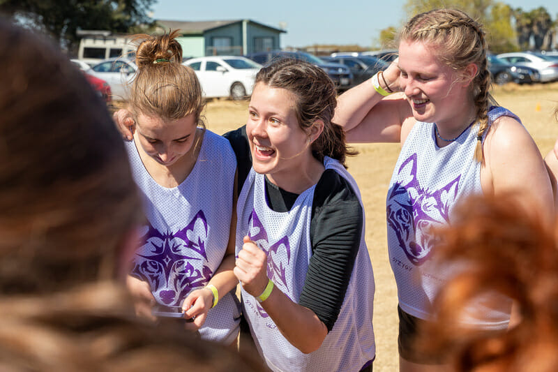 Carleton's Kate Lanier in the Syzygy huddle after winning Stanford Invite 2022. Photo: Rodney Chen -- UltiPhotos.com