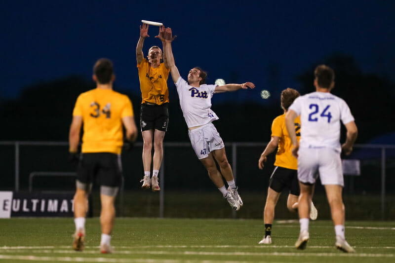Dylan Villeneuve and Brown rose above Pitt in the semifinal Sunday night. Photo: Paul Rutherford -- UltiPhotos.com
