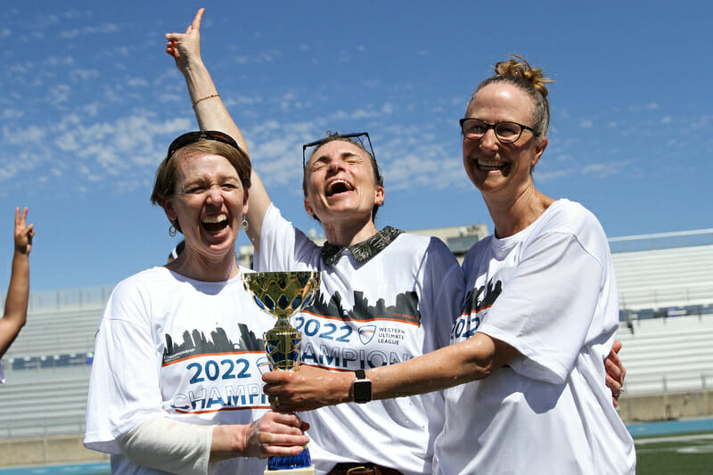 Seattle Tempest coaches -- Deb Scheibe, Rohre Titcomb, and Pam Kraus -- celebrate their victory at WUL Championship Weekend. Photo: William 'Brody' Brotman -- UltiPhotos.com