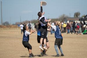 Carleton's Carly Campana goes above the crowd at the 2022 Stanford Invite.