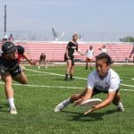 UNC's Grace Conerly gets down for the catch in the 2022 D-I College Championships final.