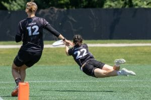 DC Shadow's Erin McCann makes a layout catch for a score in the final of the 2022 Premier Ultimate League's frisbee Championship Weekend.