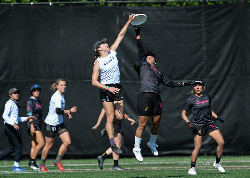 DC Shadow's Ashleigh Buch goes over a defender from Medellin Revo Pro during the 2022 Premier Ultimate League regular season.