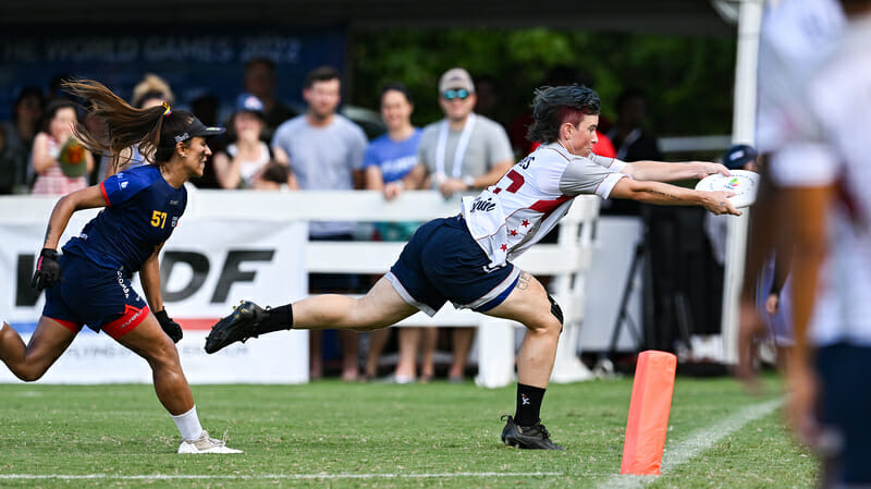 United States' Claire Chastain makes a sideline scoring catch in the semifinals at the 2022 World Games. 
