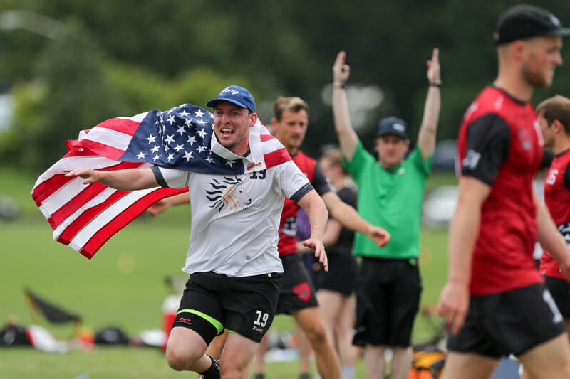 PoNY's Isaac Saul celebrates during the team's semifinal victory over London Clapham at WUCC 2022. Photo: Paul Rutherford -- UltiPhotos.com