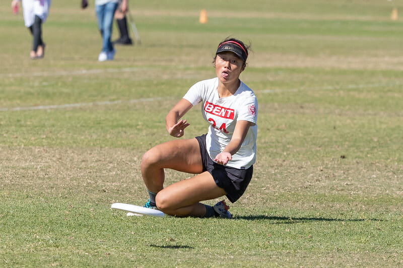New York BENT's Julie Xia lines up a low catch at the 2021 USA Ultimate Club Championships.