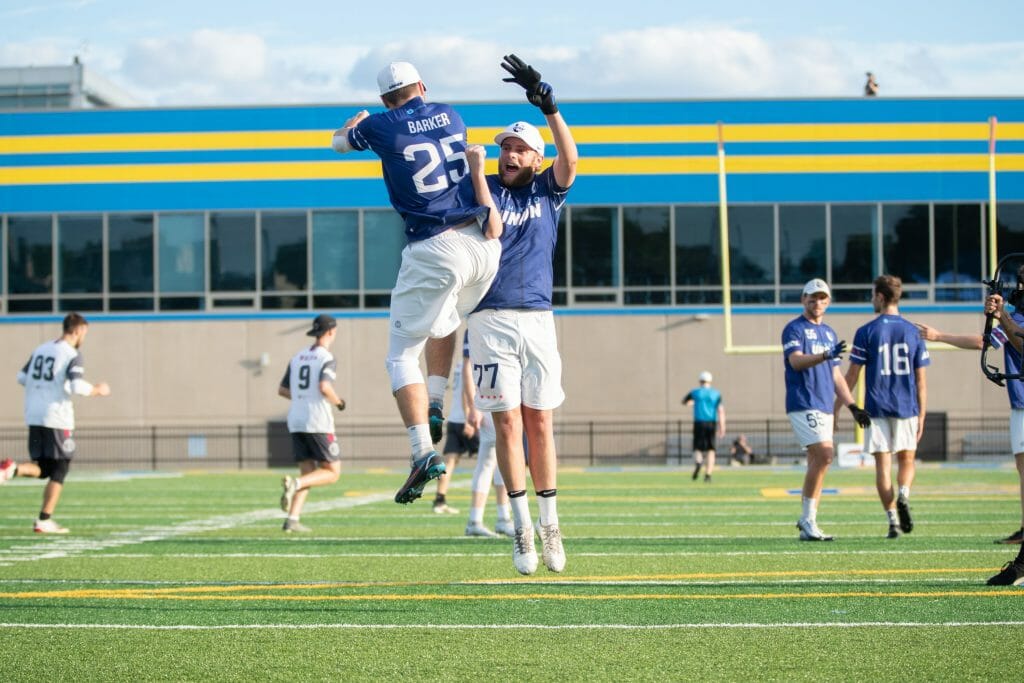Chicago Union celebrate a score in their 2022 AUDL regular season finale.