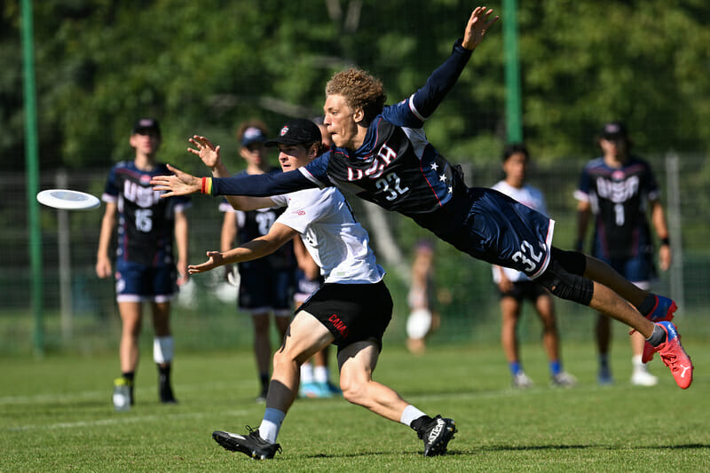 The US's Erica Brown bids for a block against Canada at WJUC 2022. Photo: Kevin Leclaire -- UltiPhotos.com