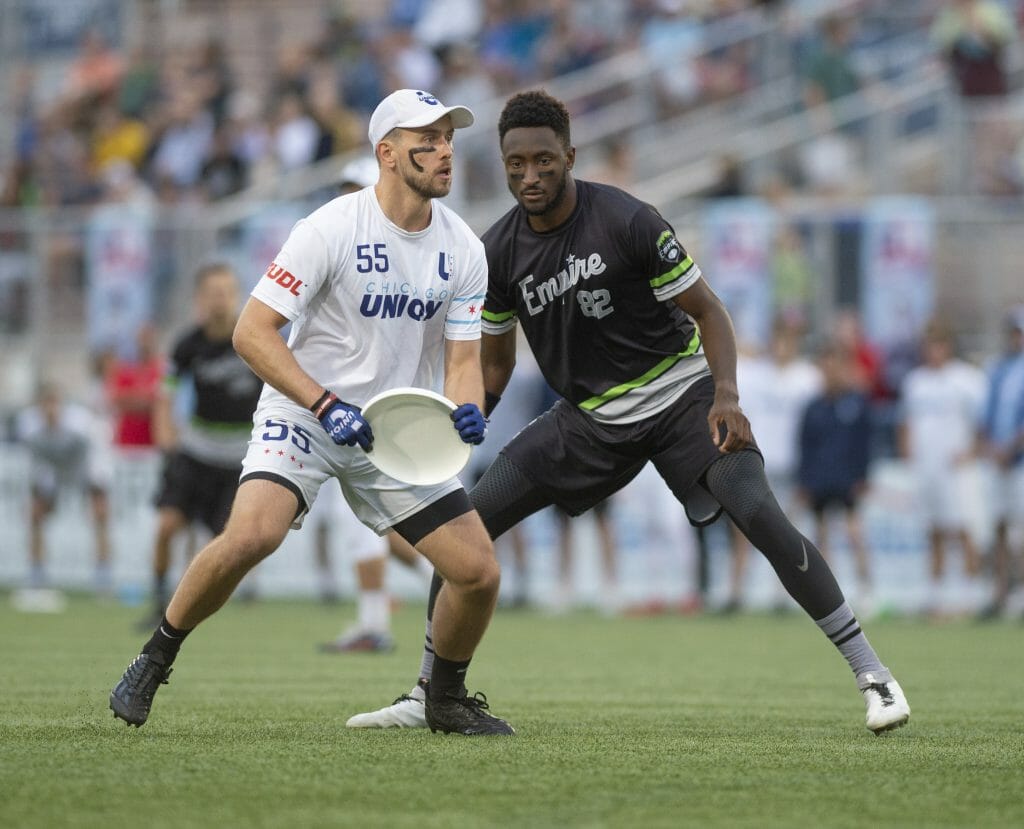 Chicago Union's Pawel Janas is marked by New York Empire's Marques Brownlee in the 2022 AUDL Championship game at Championship Weekend.