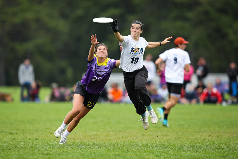 Boston Slow's Olivia Hampton gets a block on double game point against Boston Sprocket. Photo: Burt Granofsky -- UltiPhotos.com