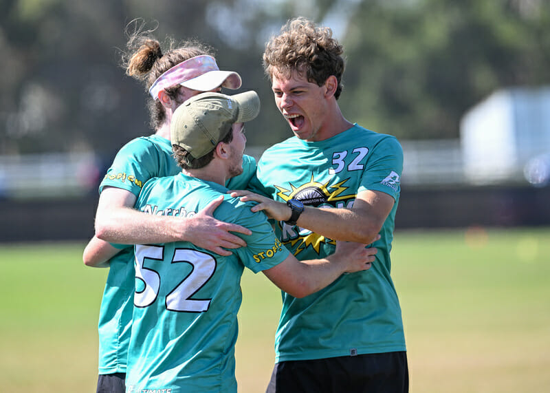 Andrew Roy and Truck Stop celebrate their victory over Ring of Fire at the 2022 Club National Championships. Photo: Kevin Leclaire - UltiPhotos.com