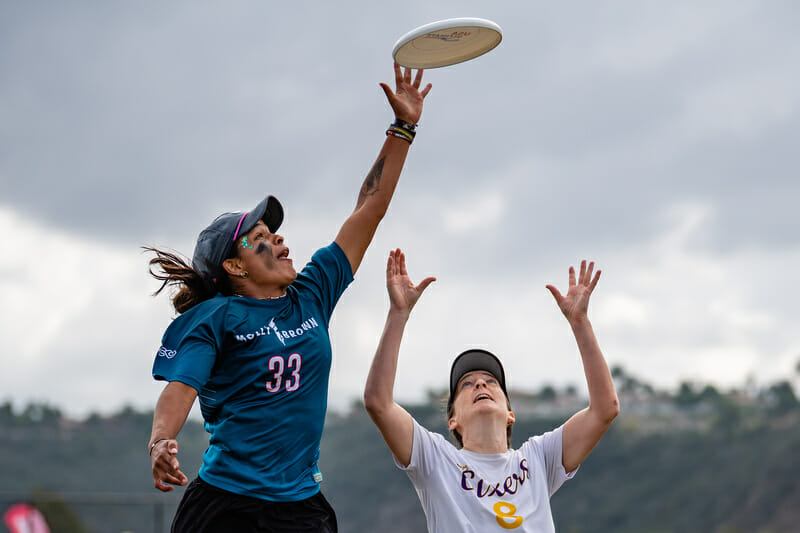 Denver Molly Brown's Valeria Cardenas get a piece of the disc on defense in their semifinal against Toronto 6ixers at the 2022 National Championships.