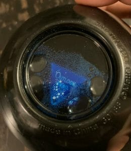 A magic 8 ball that says "outlook good"