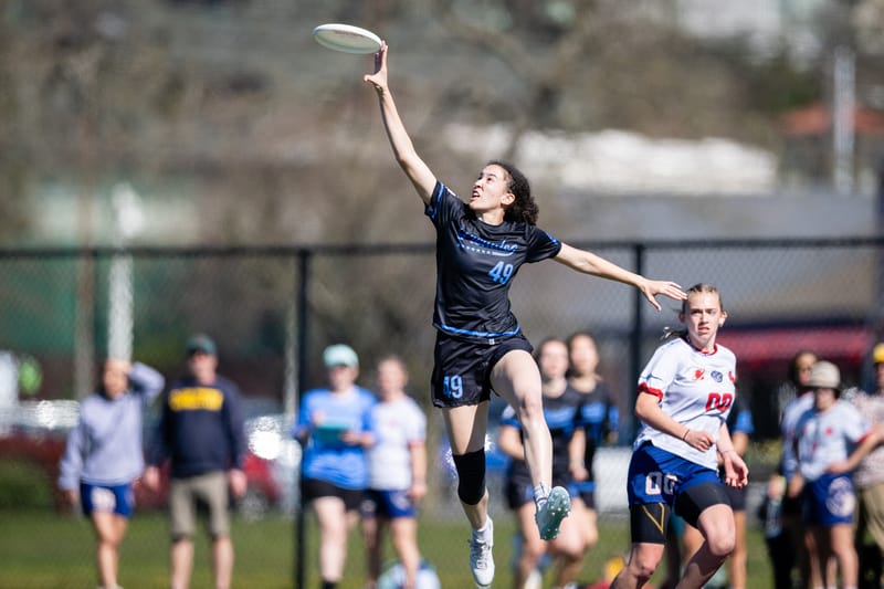 UNC's Erica Birdsong gets up for the grab at the college ultimate frisbee tournament, the 2024 Northwest Challenge. Photo: Sam Hotaling - UltiPhotos.com