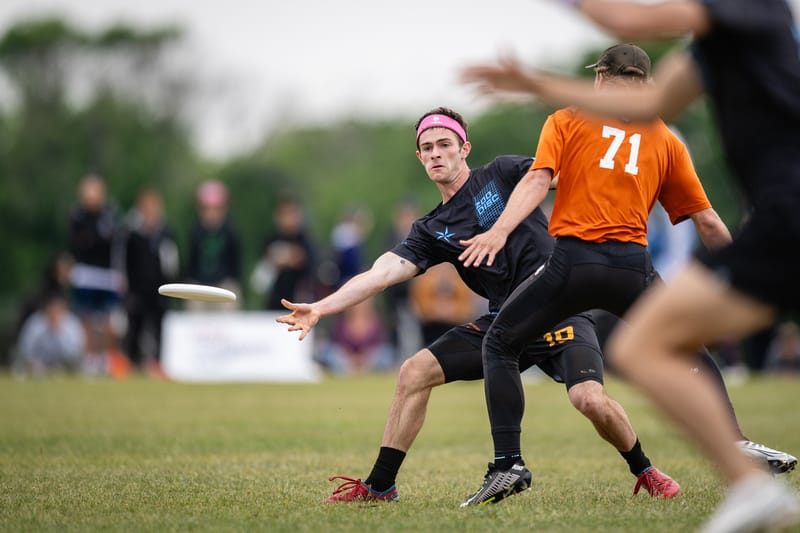 Massachusetts' Wyatt Kellman releases a flick against Texas at the 2023 D-I Ultimate Frisbee College Championships. Photo: Sam Hotaling - UltiPhotos.com