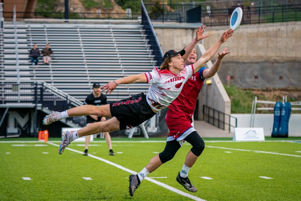 Los Angeles' Aviator's Lukas Ambrose goes flying for the layout block against the Colorado Summit. Photo: Slot Jackson - Ultimate Frisbee Association