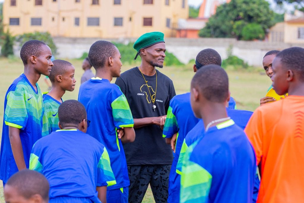 Elias Lucas with Sorenyi Secondary School ultimate players in Tanzania. Photo: Benson Laizer - Benen Vision