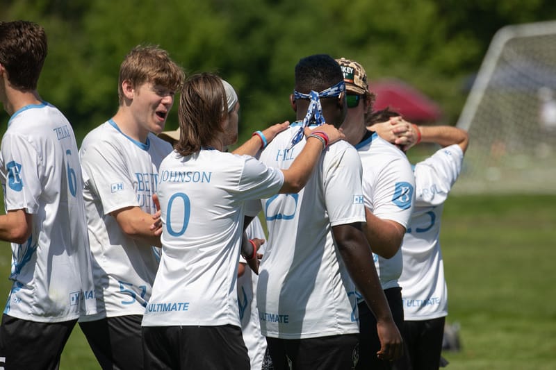 Berry teammates hype up Collin Hill at the 2024 D-III College Championships. Photo: Sydney Kane - UltiPhotos