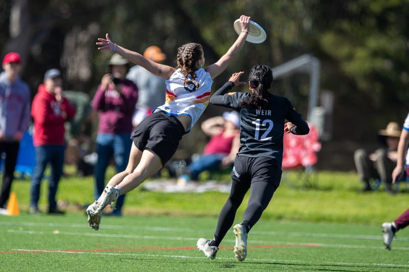 Colorado leaps to snag the disc out of the air ahead of Stanford at the 2025 Presidents' Day Invite. Photo: William "Brody" Brotman - UltiPhotos