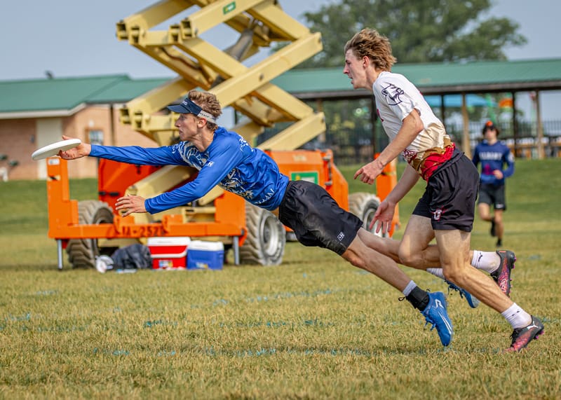 Masterman's Owen Erdman leaves his feet to make the catch at HSNI 2025. Photo: Rudy Desort - UltiPhotos